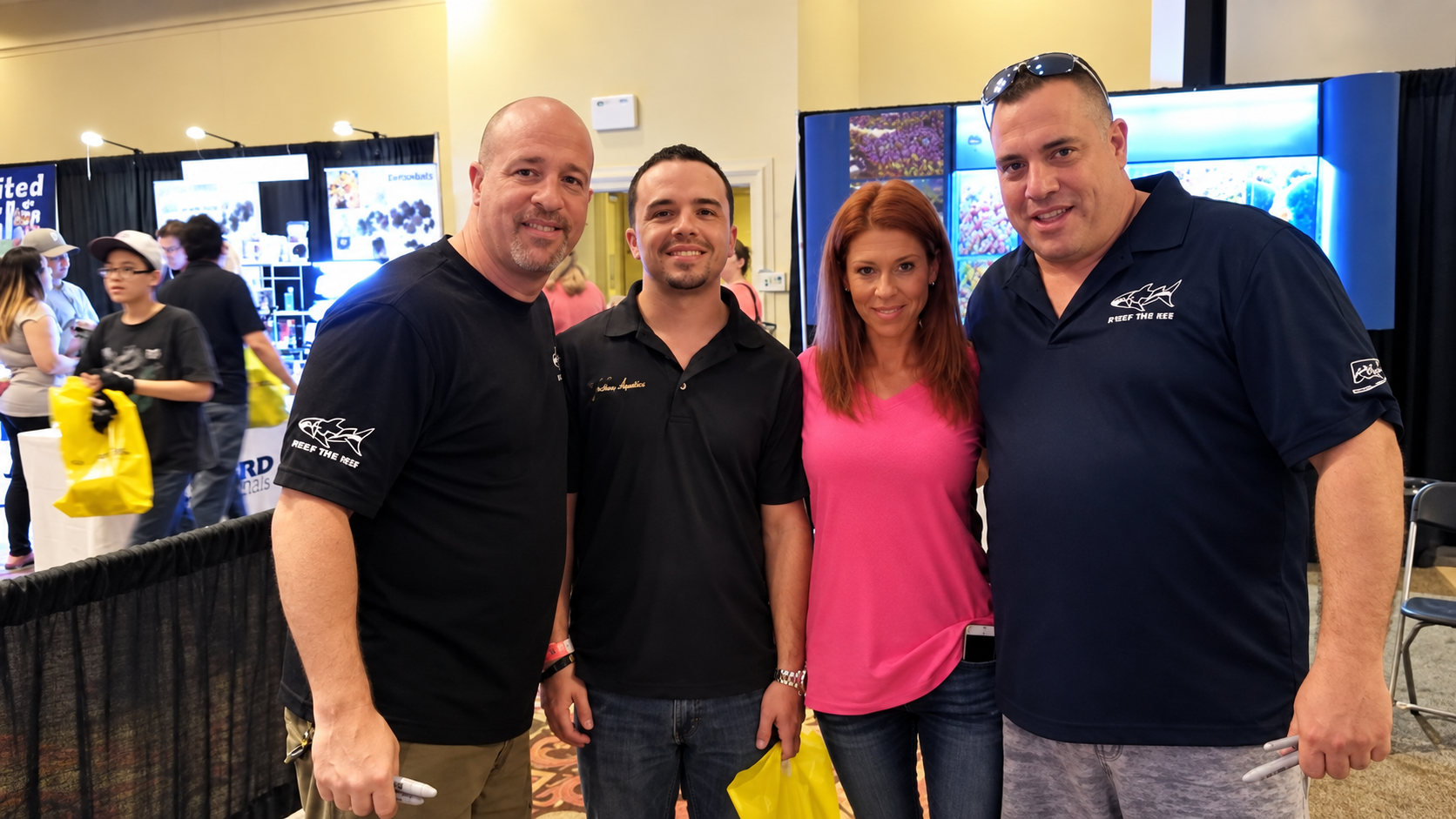 Kyle Garcia at a reef aquarium expo with members of the aquarium community